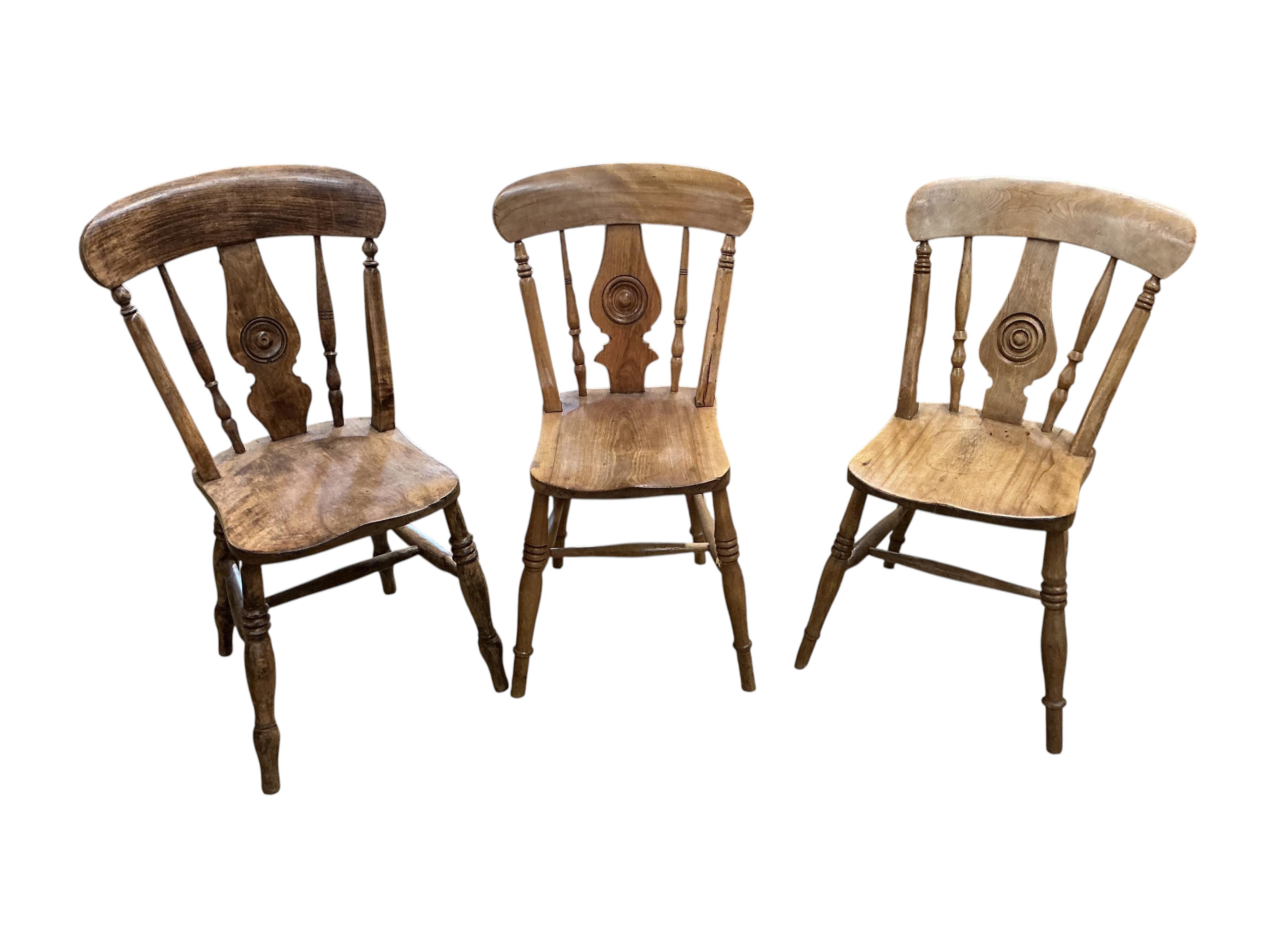 A set of six Victorian elm and beech Windsor kitchen chairs, width 45cm, depth 38cm, height 85cm